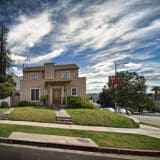 This rent-controlled duplex at 1288 S. Orange Drive is listed on multiple home-sharing platforms in violation of a new Los Angeles city ordinance.