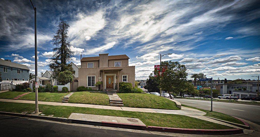 This rent-controlled duplex at 1288 S. Orange Drive is listed on multiple home-sharing platforms in violation of a new Los Angeles city ordinance.