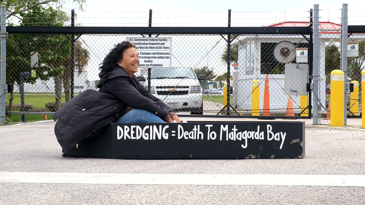 Diane Wilson protests outside the Army Corps of Engineers offices in Galveston on May 12. Photo by Dyar Dentz.