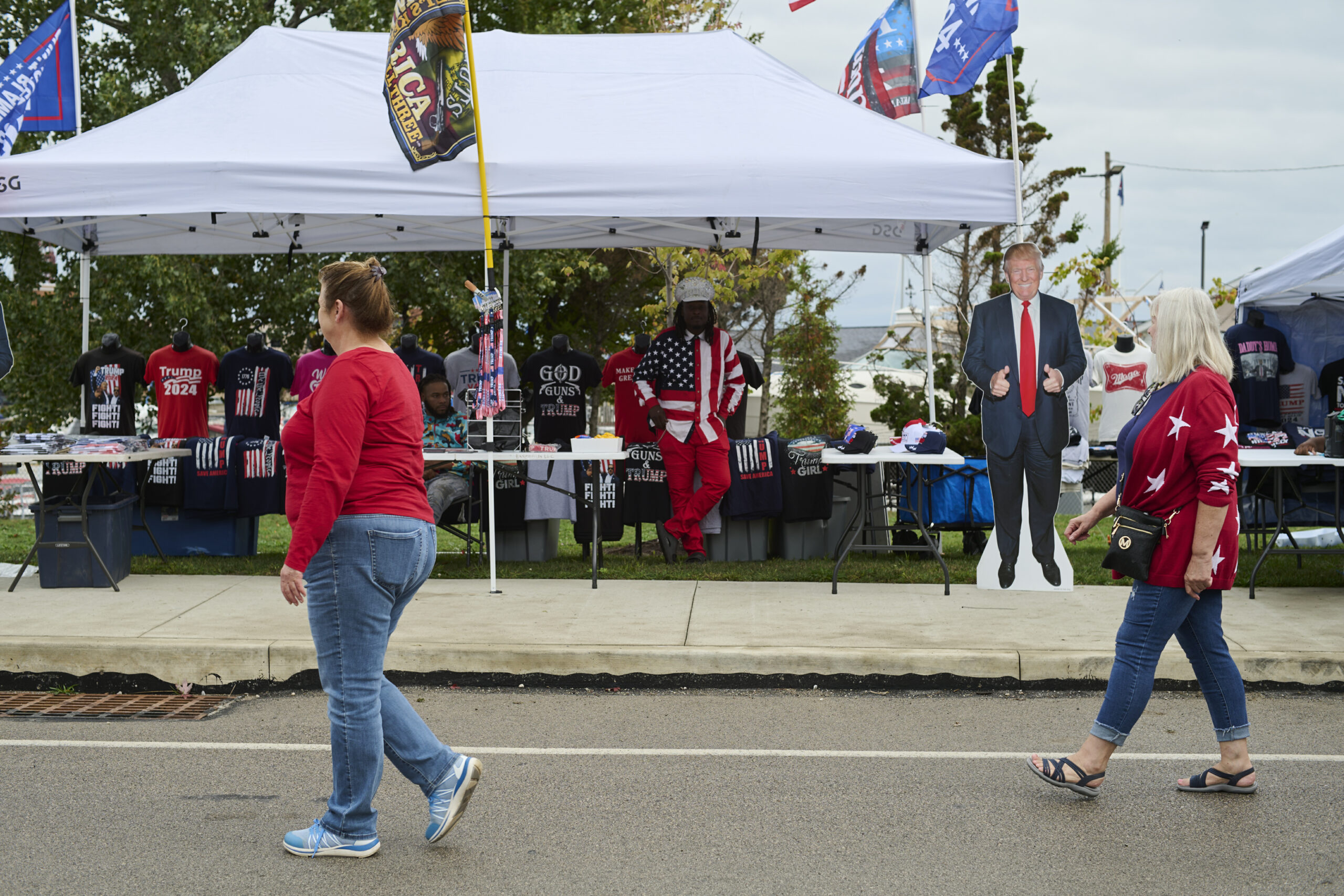 Merchandise lines the path to a rally for Donald Trump at the Bayfront Convention Center.